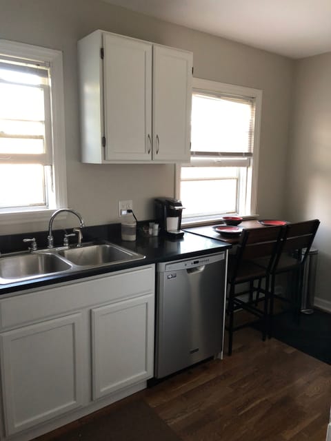 Kitchen has a dishwasher/microwave/range