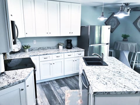 Open kitchen with full size appliances