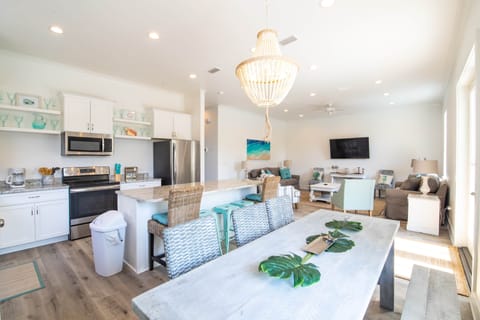 Free flowing chefs kitchen, dining, and living space. Wonderful for entertaining and family gatherings!