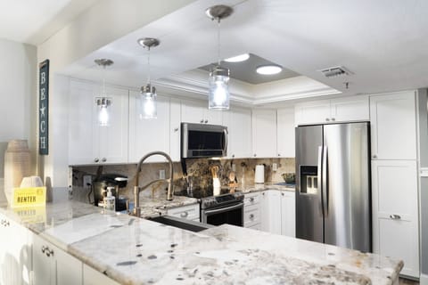 Fully stocked kitchen with beach view, everything you need to make meals 