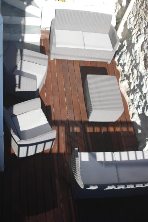 Exotic wooden terrace in front of the house