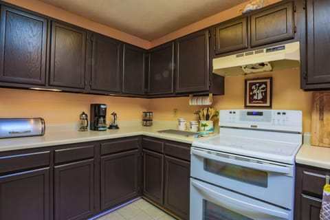 The kitchen is stocked with all essential kitchen equipment & gear.