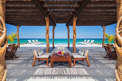 Covered Patio overlooking pool.
