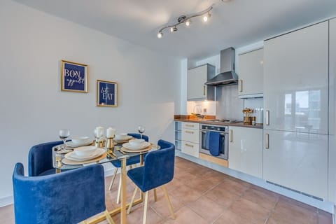 The apartment features a well-equipped kitchen complete with a dishwasher, fridge freezer, oven, stove, microwave, kettle, toaster, cookware, tableware, and utensils are all provided.