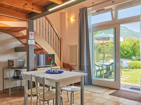 Furniture, Property, Table, Plant, Chair, Wood, Interior Design, Building, Lighting, Architecture