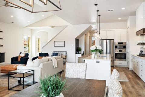 Open concept kitchen, dining, and living areas allow groups to gather comfortably