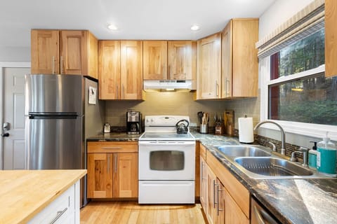 Create home-cooked masterpieces in the fully equipped kitchen