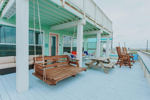 Balcony with HUGE bed sized swing, plenty of seating for you & your guests!