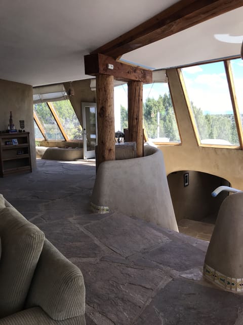 Grand Staircase Leading Down To 2 Bedroom Suites.