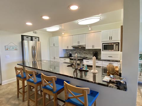 Beautiful kitchen stainless steel appliances and granite countertops 