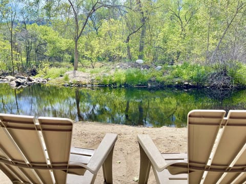 River flows on either side of the island in the backyard (seasonal on one side).