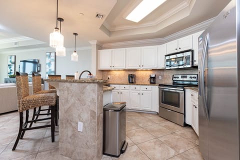 The kitchen features stainless appliances, granite countertops, a Keurig and coffee maker, for delightful mornings