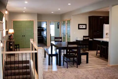 dining area with master bedroom & 2nd bedroom in background