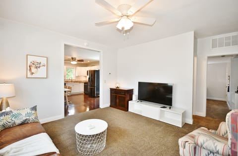 Living room area with large screen HD TV, Roku streaming device for Netflix etc.