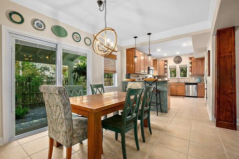Open kitchen and dining space with seating for the entire home