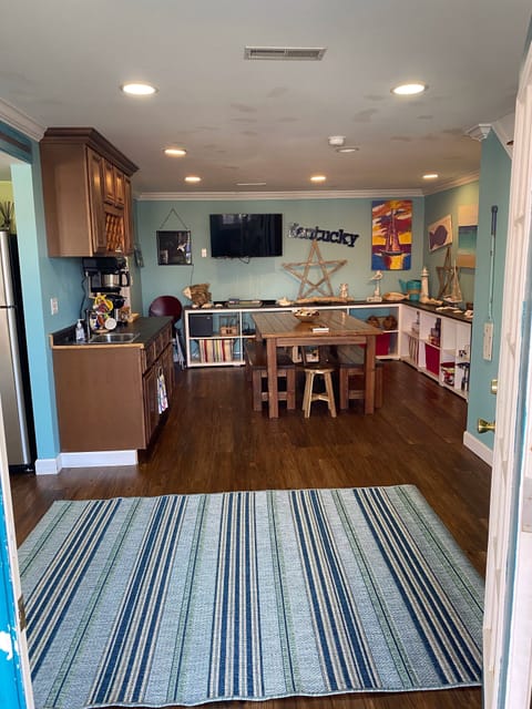 Game room leading out to large back deck and private back yard 