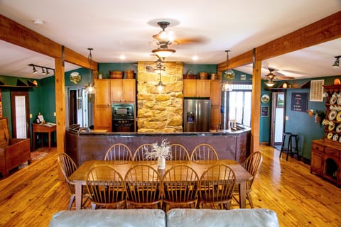 Great room opens up on to a large deck overlooking the Maury River.