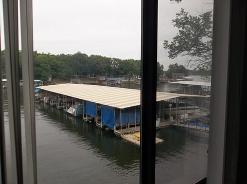 View of the lake and boat docks from the guest bedroom