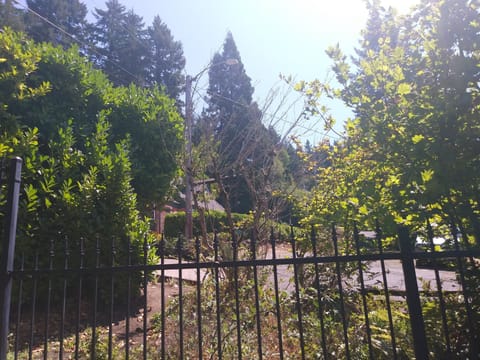 View from end of driveway, there is a gate that is kept open for guests.