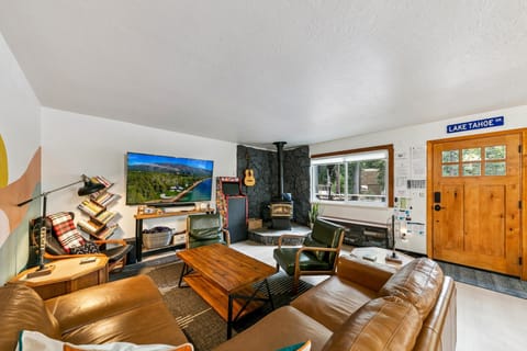 Cozy living room with rustic charm and mountain views