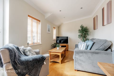 The lounge benefits from a large smart TV