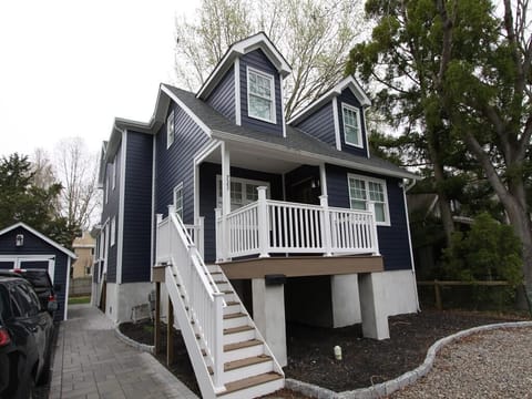 Front of house - open front porch with seating