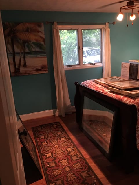 Main level queen room full bathroom across the hall