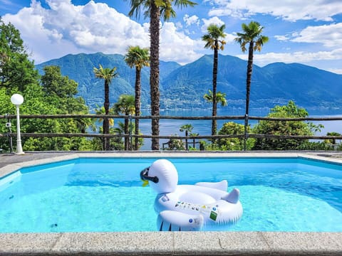 Swimming Pool, Resort, Leisure, Outdoor Furniture, Umbrella, Eco Hotel, Mountain Range, Resort Town, Vacation, Tropics