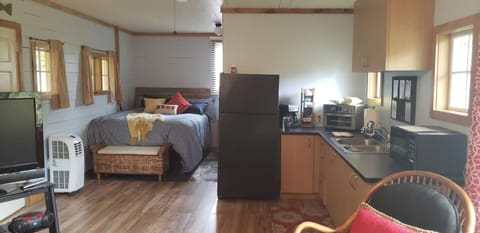 Plus queen bed and kitchen are among some cozy amenities at the studio cabin