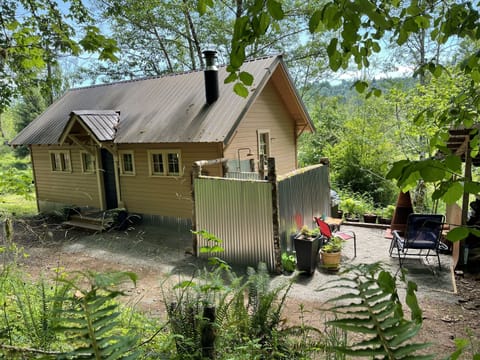 Back view of seating area and outdoor shower