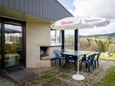 Plant, Cloud, Table, Property, Sky, Shade, Building, Outdoor Furniture, Outdoor Table, Door