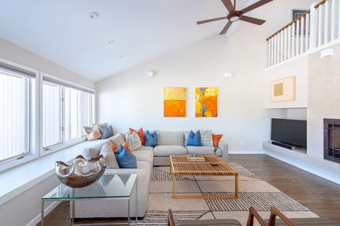 Light filled, open living room with views of Wonderland Lake.