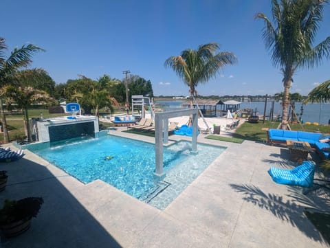 This 250k plus pool was custom built by me and my wife it has 3 pumps and every feature you could ever ask for including pool for misters!