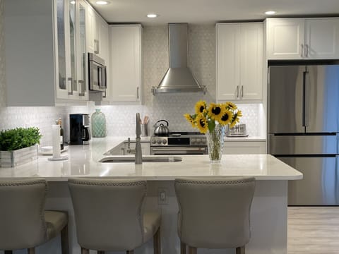 Beautiful kitchen, Stainless steel appliances, Quartz counter tops. 