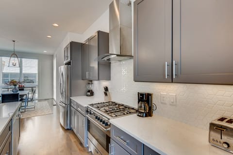 Prepare a nice meal in the fully stocked kitchen