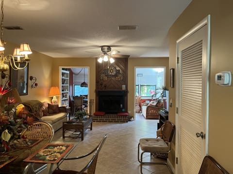 Living room with wood burning fireplace