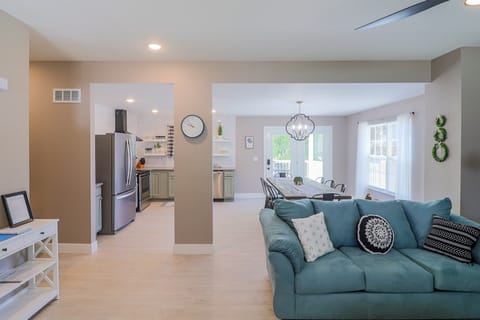 View when you walk in front door. Couch shown is a sleeper sofa. 