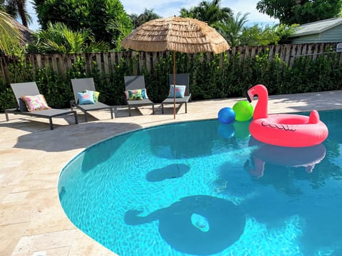 Crystal clear, well maintained Heated, salt water pool with travertine deck.