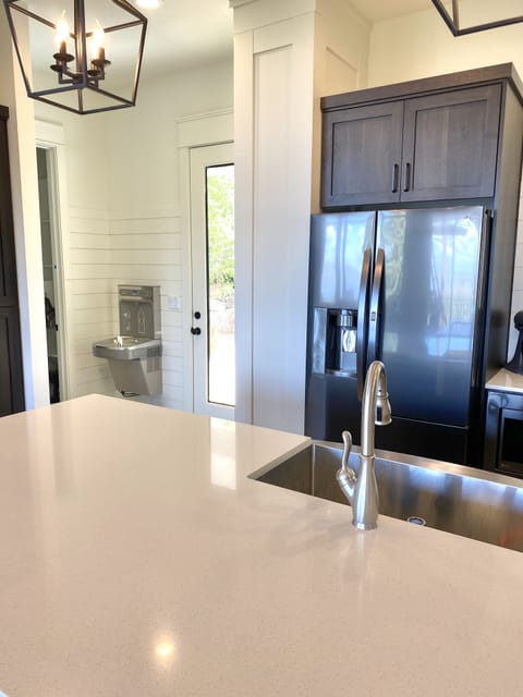 Main fridge/freezer, drinking fountain (second fridge/freezer is in pantry)