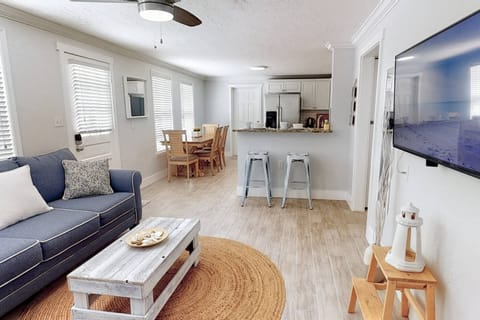Kitchen and living room are open to each other.   New Smart TV with Cable in the living room.
