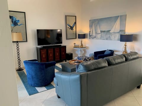 living room with wall of large sliding door s