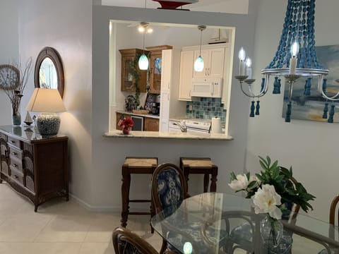 View from the dining area into kitchen via the pass-thru.