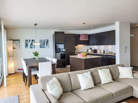 Furniture, Interior Design, Couch, Flooring, Floor, Room, Living Room, Ceiling, Wood, Table