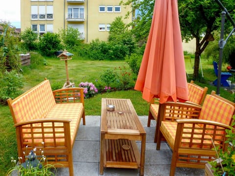 Plant, Furniture, Property, Building, Window, Table, Green, Chair, Tree, Flower