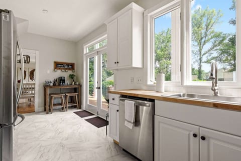 Don't miss any of the action from this open corner kitchen