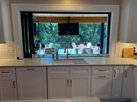 Kitchen opens to back porch