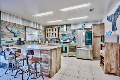 Open kitchen & dining area designed for shared meals & conversation
