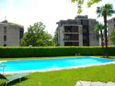 Water, Plant, Sky, Building, Swimming Pool, Azure, Grass, Land Lot, Tree, Leisure