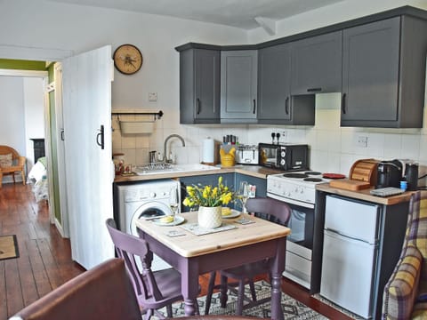 Cosy open plan kitchen/living room | Fern Cottage, Thorngrafton, near Bardon Mill