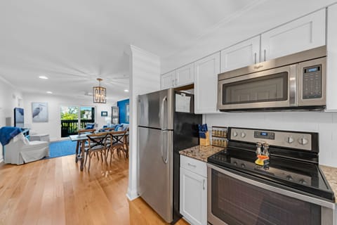 Kitchen opens to the dining and living areas